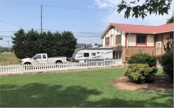 We visited some human friends in Tennessee (that's a stupid name) on the Fourth of July. This is their house.  July 5, 2020.