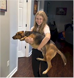 My grandhuman Claire loves me.  But she's always gotta carry me around somewhere.